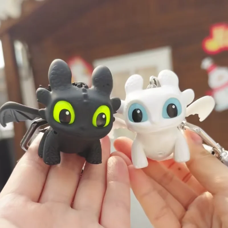 Genuine Potdemiel Dragon Tamer Toothless Keychain Movable Wing Glowing Eyes Bag Pendant Creative Couple Men Women Gift toys
