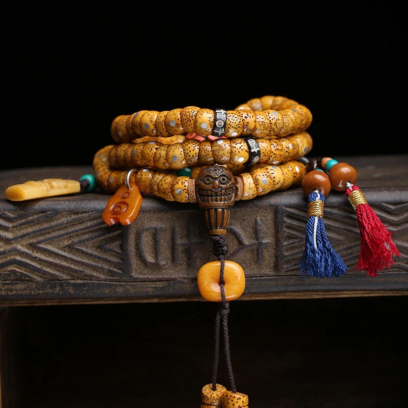 108 of-Moon Bodhi beads, cut pieces from old stock, with a bone peace and clasp accessories