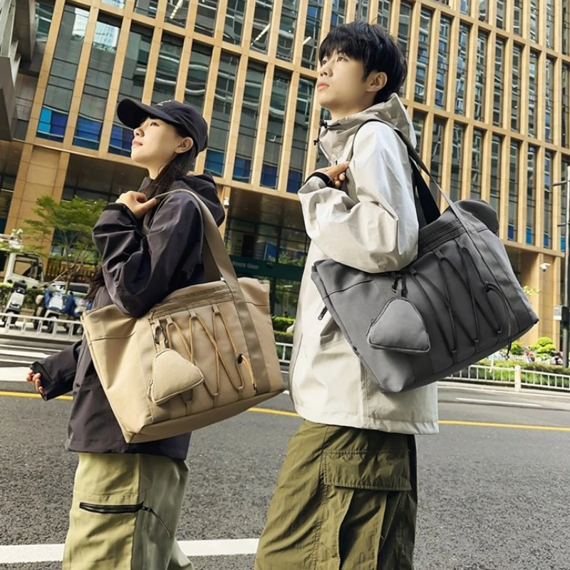 

Solid Color Oxford Zipper Travel Handbag Fashion Soft Trendy Crossbody Bag 2026 High Quality Large Capacity Simple Shoulder Bag