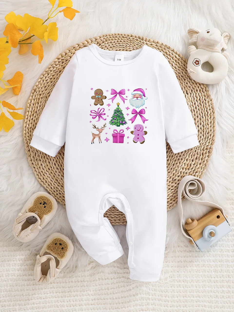A baby long-sleeved onesie with interesting letter prints. It features a buttoned design for easy putting on and taking off