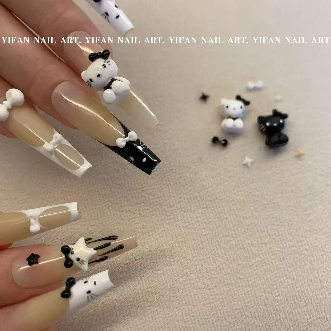 ชาร์มตกแต่งเล็บลายเฮลโลคิตตี้ 50 ชิ้น สีดำขาว คละแบบ น่ารัก 3 มิติ รูปหัวใจและโบว์  อุปกรณ์ตกแต่งเล็บสุดเก๋ น่ารัก สำหรับทำเล็บ