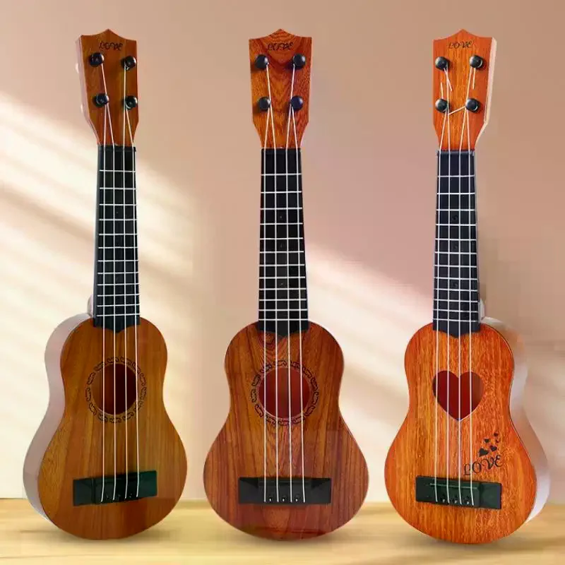 لعبة جيتار يوكريلي للأطفال، تعليمية وتعلمية، تتميز بـ 4 أوتار ومجاذيف، مقاس 26/35 سم.