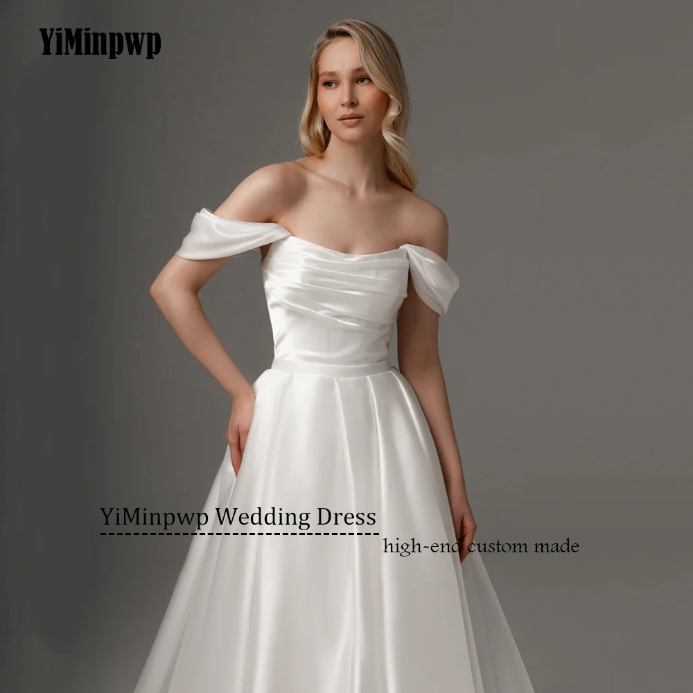 فساتين زفاف أنيقة من الساتان مع ذيل قابل للانفصال بدون أكتاف على شكل حرف a مشد مخصص لحفلات الزفاف 2022 Rode De Morrie