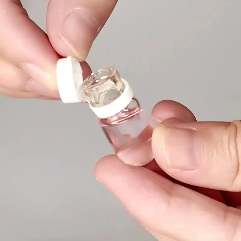 10 Stück Mini-Glasflaschen, leere Flaschen, 1,5 ml, Reiseprobe, ätherisches Öl, Essenz, flüssige Hautpflege, Kosmetik, Make-up-Entferner