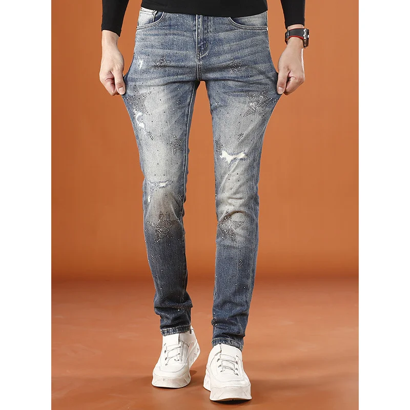 Pantalones rasgados de moda de alta gama para hombre, pantalones ajustados con diseño de estampado de moda elástica de otoño e invierno, 2025
