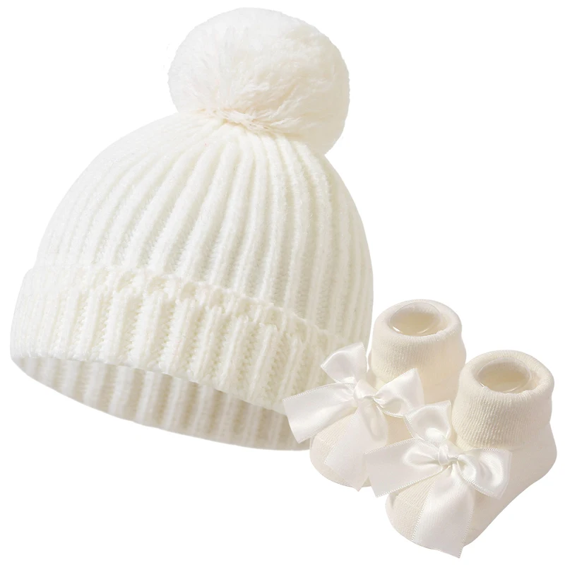 

2pcs Pompom Ball Baby Hats Bowknot Cotton Baby Socks Girl Autumn Winter Newborn Beanies Caps Knitted Warm Kids Crochet Hats
