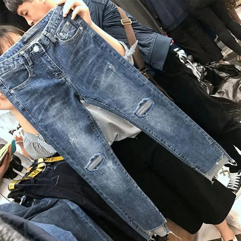 Hoge taille afslankende denim jeans Dames Faion potloodbroek Asymmetrische split Enkellange rechte pijpen Trendy gescheurd gat