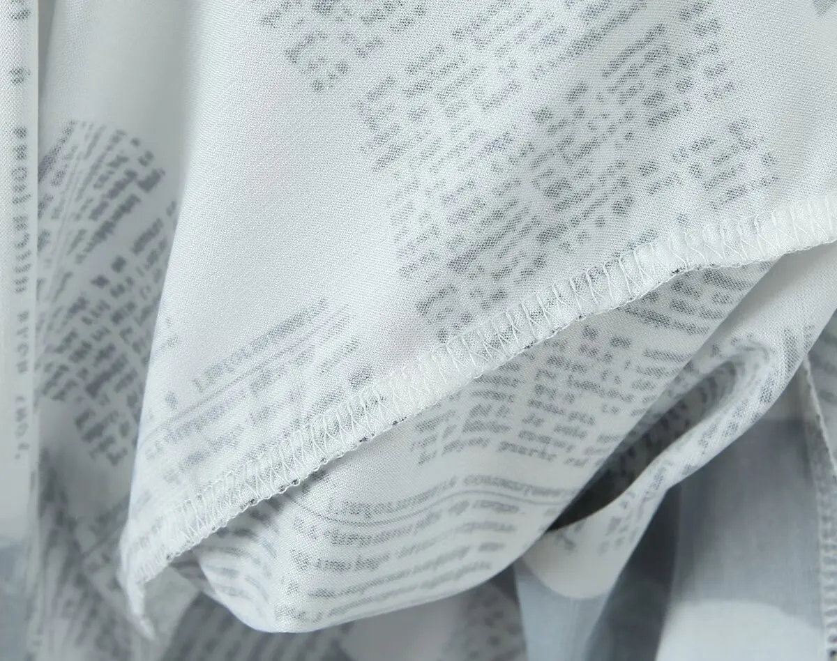 YENKYE Neues Damenkleid mit Zeitungsdruck, unregelmäßigem Saum, modisches rückenfreies Kleid mit dünnen Trägern und Kette, sexy Sommerkleid – Detail 12