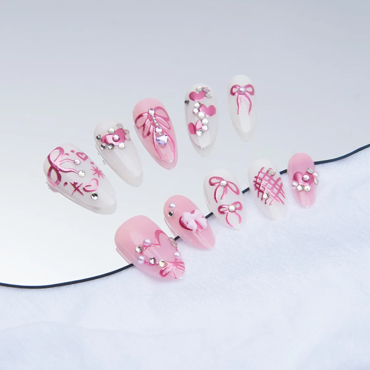 

24PCS Sweet Pink Bow False Nails with Sparkling Diamond Heart Pearl Almond Fake Nails French Style Valentines Day Press on Nails