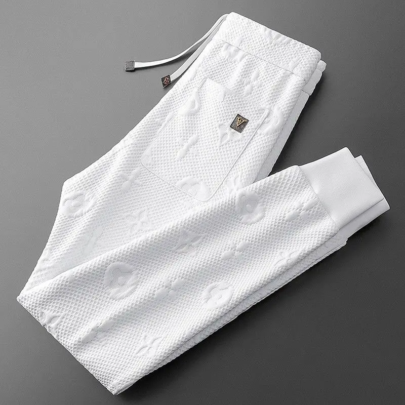 3D three-dimensional jacquard fashion trend men's slim-fit sports knitted sweatpants casual pants