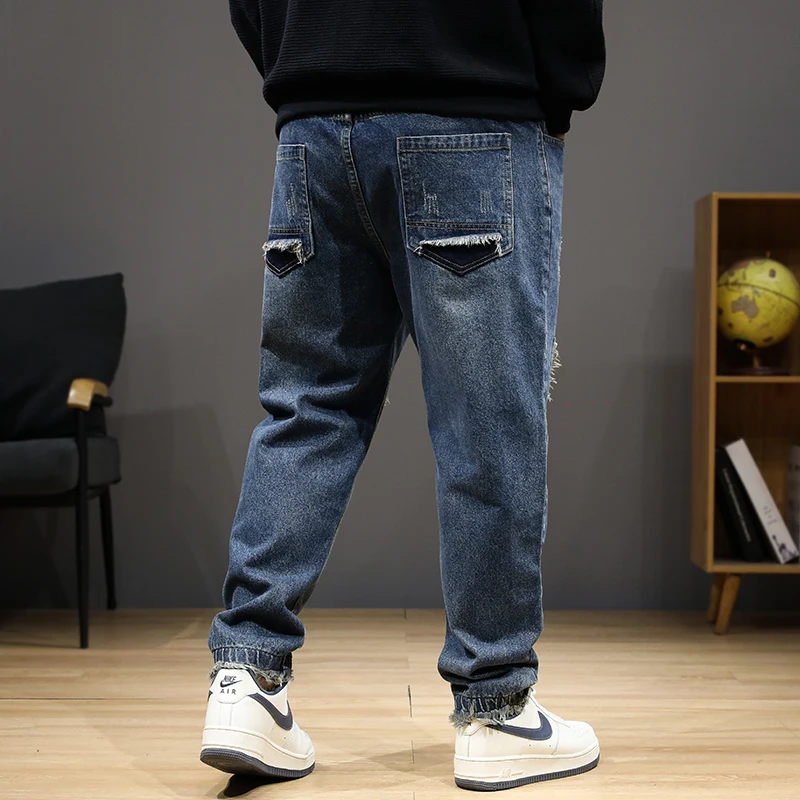 عداء ببطء الجينز الرجال الدنيم السراويل حجم كبير 8XL موضة المرقعة الجينز عادية مرونة الخصر الدنيم السراويل الذكور سراويل كبيرة الحجم