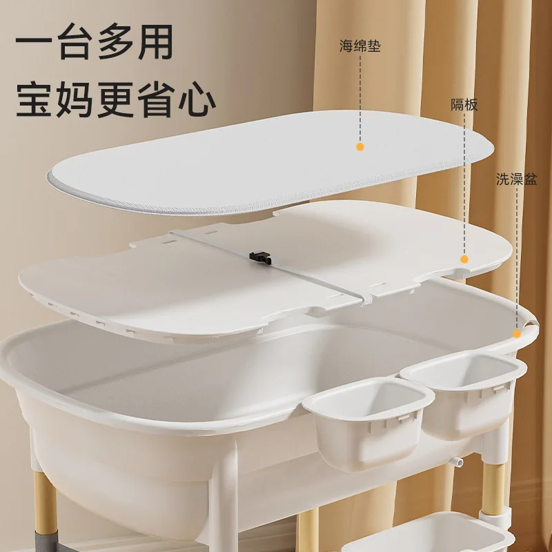 Image 4: Table de soin pour bébé Babyfond, multifonctionnelle, intégrée, mobile, pour le change, le bain et le massage des nouveau-nés.