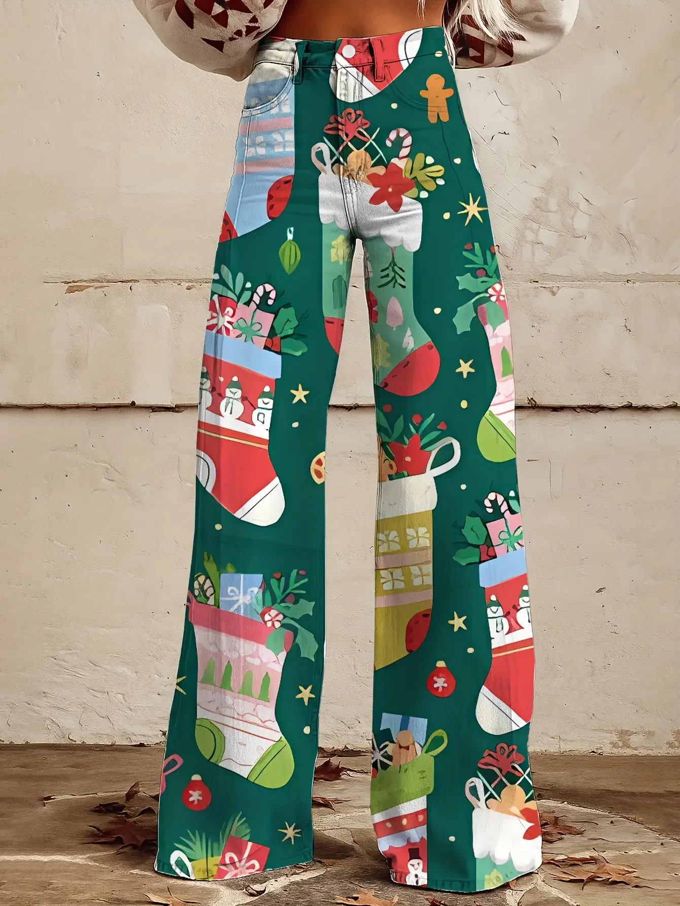 Ladies' imitation denim pants featuring Santa Claus, snowflakes, pine cones, and star patterns for autumn and winter