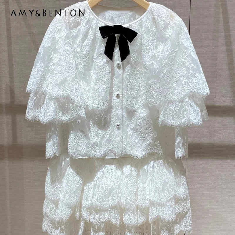 

Новинка Весна 2026: Женский комплект из топа в стиле накидки с бантом и кружевными вырезами и пышной короткой юбки. Французский дизайн, нежный, стильный, элегантный.