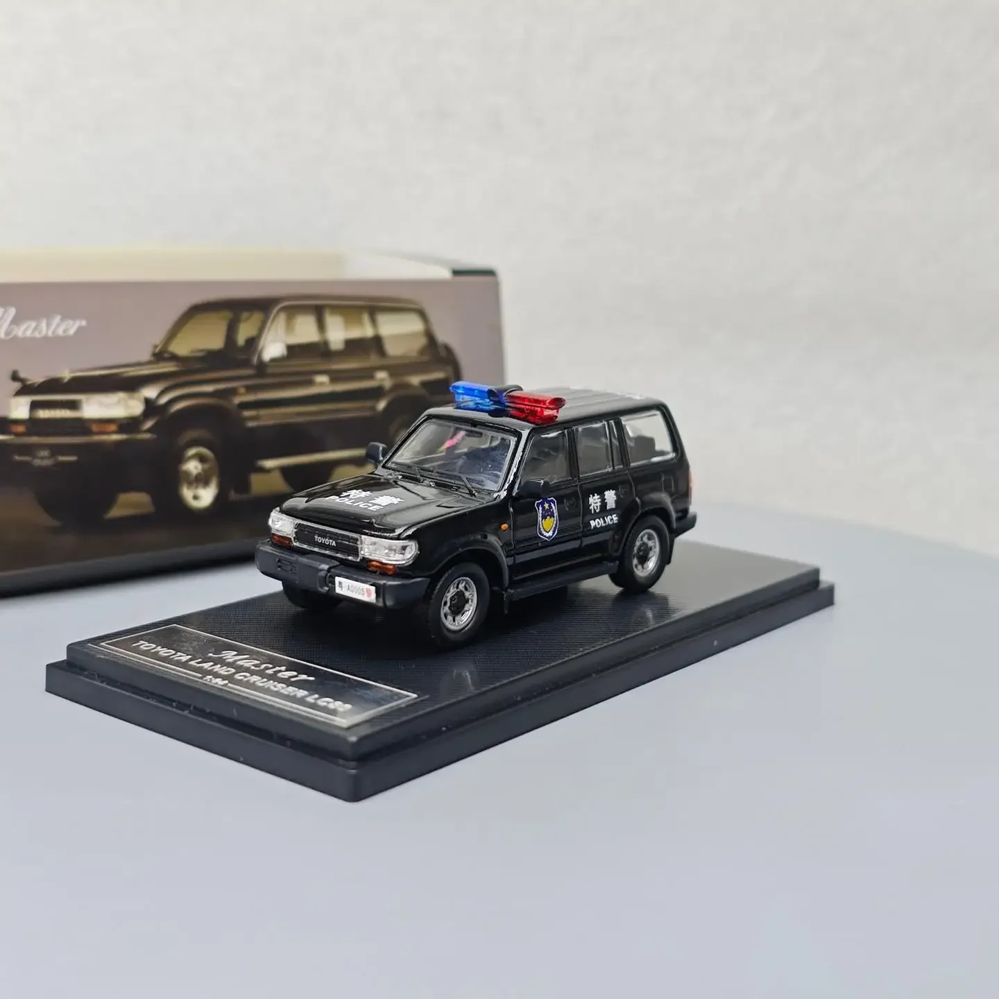 1:64 Land Cruiser LC80 Spezialpolizeiversion Simulation Legierung Mini Automodell Sammlung Geschenk Spielzeug