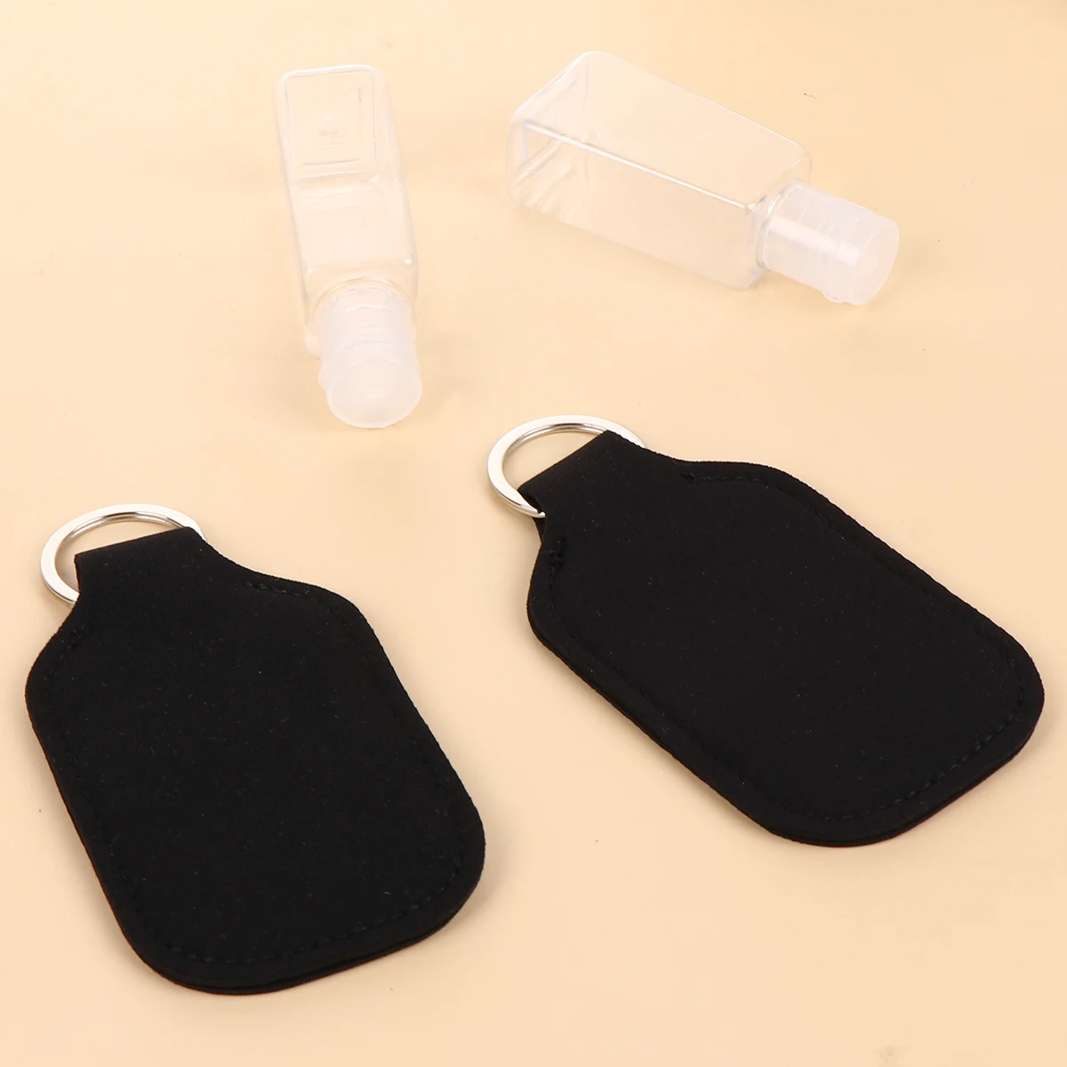 6 szt. Pokrowców na butelki perfum, przenośne, neoprenowe, w stylu breloczka, wielokrotnego użytku, lekkie, ochronne pojemniki do przechowywania kosmetyków.