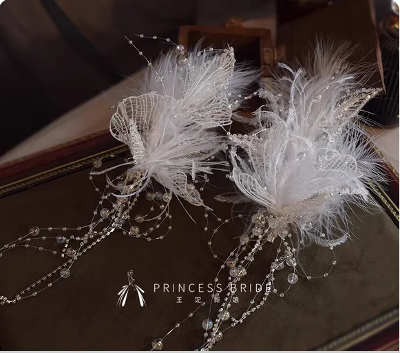 Bridal headdress feather white lace super fairy princess beautiful fashion temperament elegant tassel clip wedding accessories.