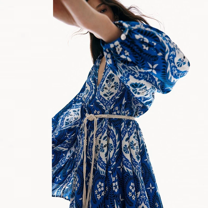 เดรสลายดอกไม้สไตล์วันหยุด แฟชั่นคอตั้ง แขนยาว ทรงหลวม สไตล์โบฮีเมียน สำหรับใส่ไปเที่ยวทะเล รุ่นใหม่ปี 2026 ชุดเดรสผู้หญิงสไตล์โบฮีเมียนสำหรับวันหยุด