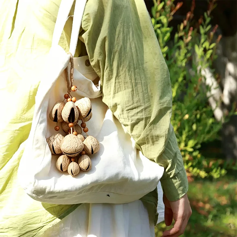 Picture 6: Handmade Nutshell Chimes Hand Bell Portable Sound Healing Fruit Shell Chime for Meditation Yoga Relax