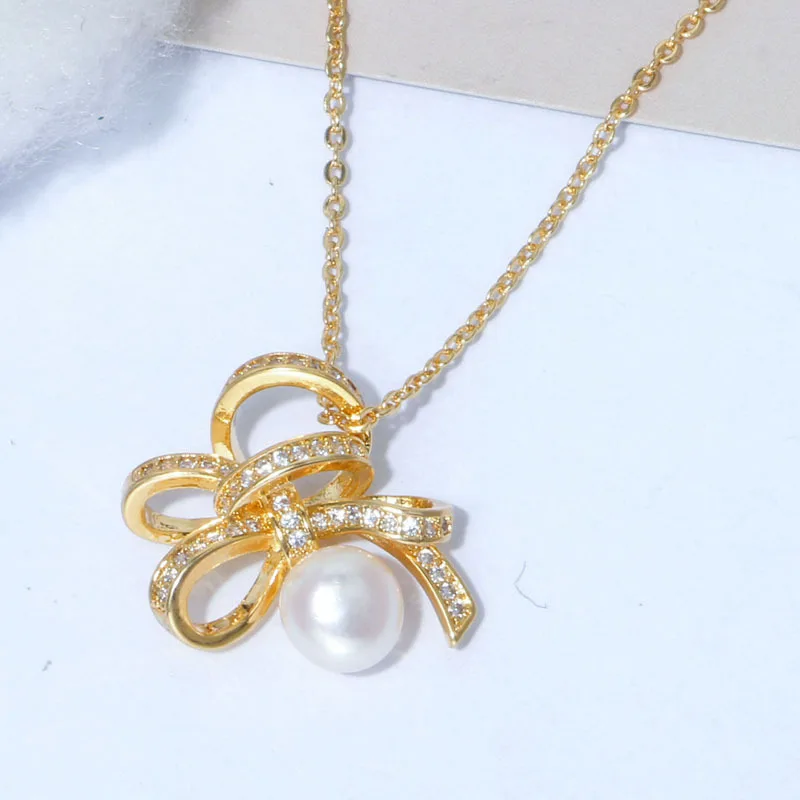 2022 New Arrival Elegant  Natural Bread Pearl Bowknot Pendant Necklaces for Women