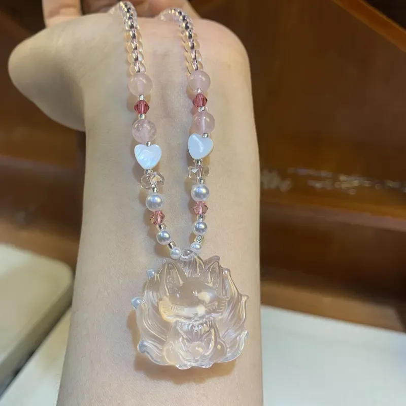Ice pink nine-tailed fox pendant, new Chinese handmade exquisite beaded engraving jewelry necklace, peach blossom crystal