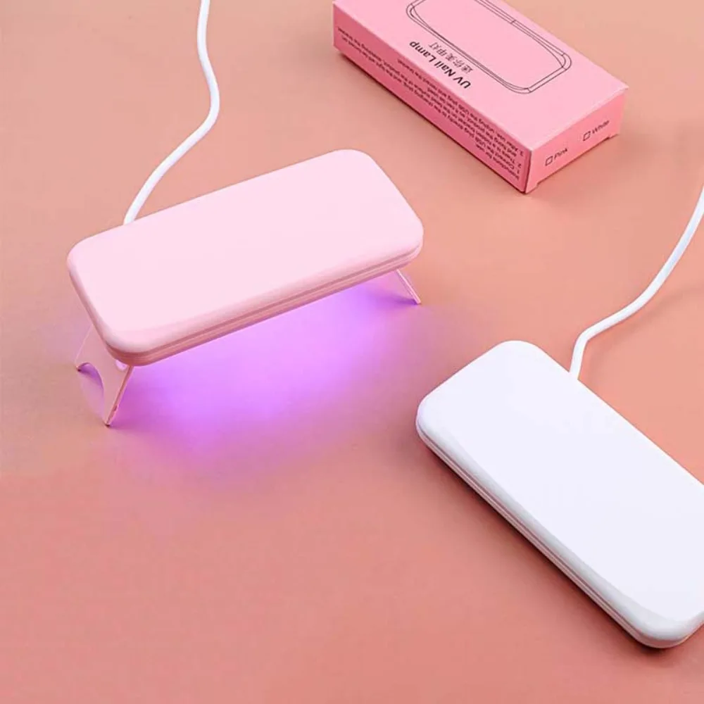 Lampada per asciugare le unghie con smalto gel UV LED Fototerapia per unghie Mini essiccatori per unghie a polimerizzazione ad asciugatura rapida Essiccatore per smalto gel bianco rosa