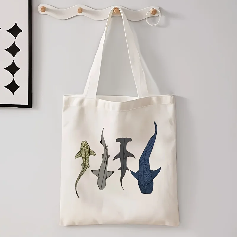 A Cartoon shark print canvas tote bag, suitable for daily use, shopping, school, and travel
