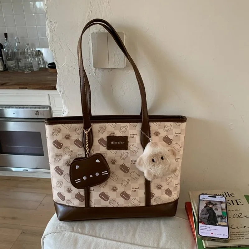 

Стильная дизайнерская сумка-сатчел из кожи для женщин, элегантная сумка через плечо, вместительная сумка-тоут.