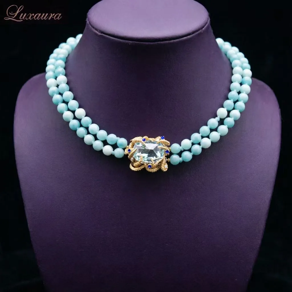 

Vintage jewelry featuring a fashionable and classic blue geometric necklace design paired with Bohemian style women's necklace