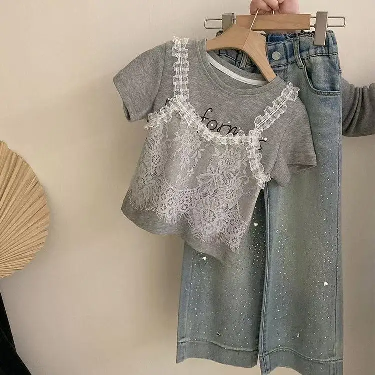 

Girls' Summer Korean Edition Set Lace Fake Two piece Short sleeved T-shirt New Middle and Large Children's Loose Cowboy Pants