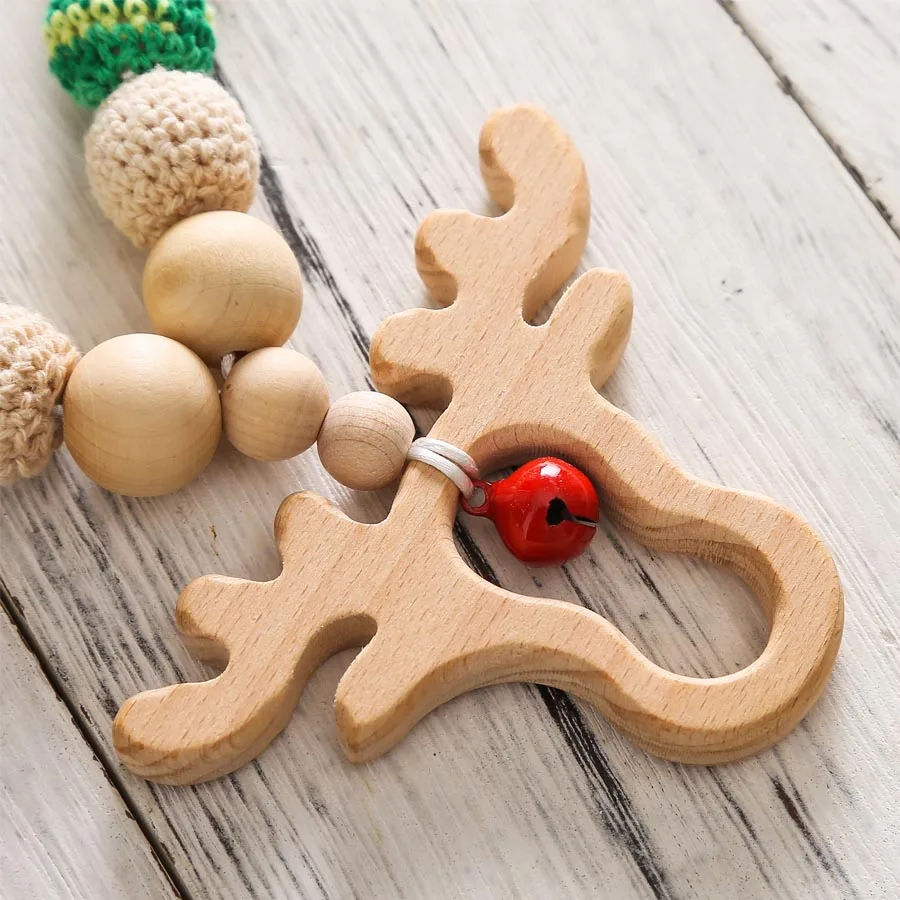 1 pz di legno carrozzina Clip giocattoli uncinetto sonaglio collana anelli di legno braccialetto fatto a mano ciuccio Clip a catena per il regalo del bambino