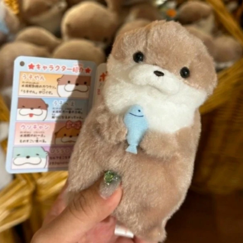 Selling Cute Little Otter Holding Fish Plush Plush Toy Keyrings Lightweight Hanging Pendant Props For School Bag Key Wallet