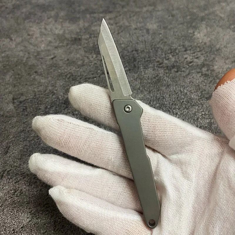 

Titanium alloy mini EDC folding knife, keychain knife, unboxing express delivery folding knife, portable outdoor pocket knife
