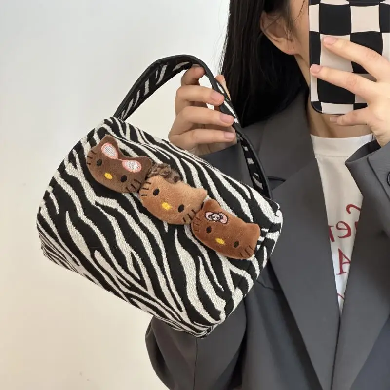 Miniso Hellokitty trousse de maquillage Kawaii motif léopard sac de rangement à main en cuir noir Kt trousse de rangement de toilette sac à main