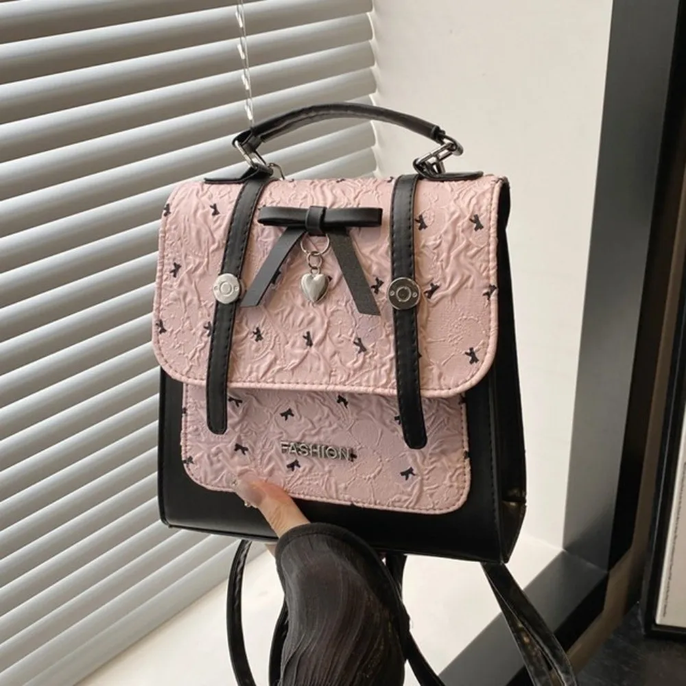 حقيبة ظهر نسائية على الطراز الياباني الجديد مصنوعة من جلد البولي يوريثان باللون الوردي والأبيض وحزام قابل للتحويل حقيبة كتف متينة مقاومة للماء للاستخدام غير الرسمي