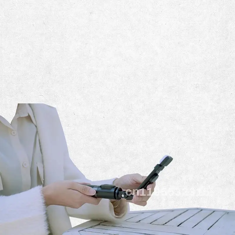 Neue Handy Selfie Stick Stativ Selfie Artefakt Live-Halterung Bluetooth Teleskop integrierte Handy-Halterung