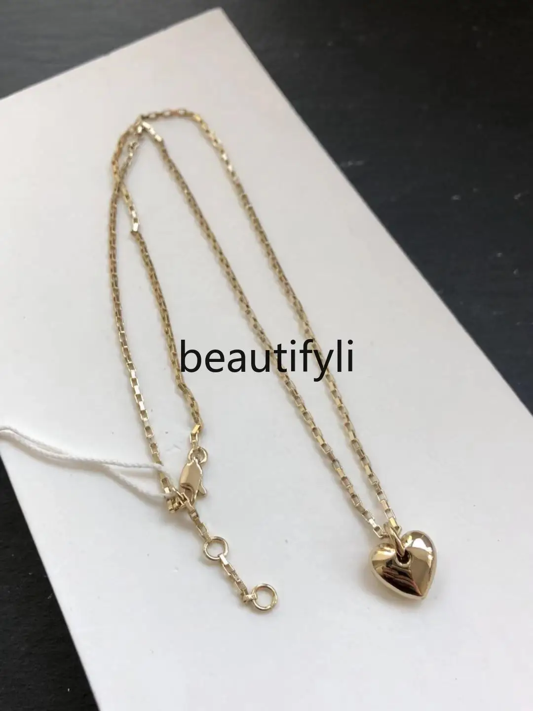 

Limited edition light gold small peach heart European and American versatile necklace