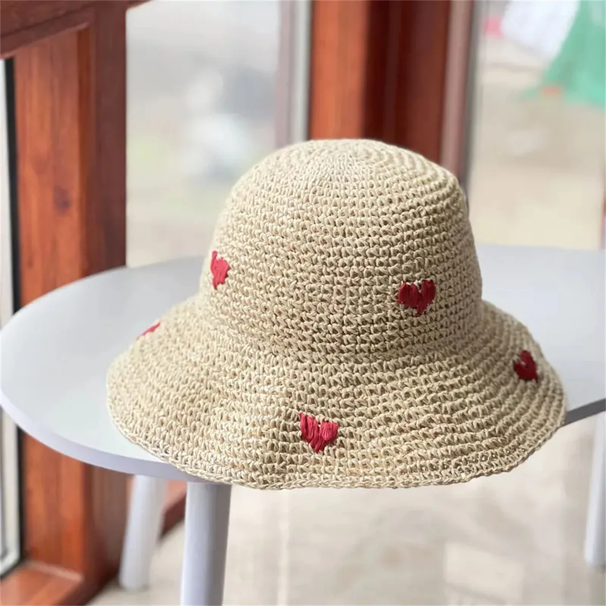 An Insta-style wavy edge large eaves straw fisherman hat women\'s summer braided love straw hat holiday beach breathable sunshade