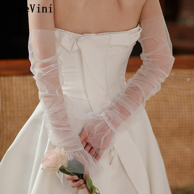 JaneVini Sheer Tulle เจ้าสาวถุงมือยาวสําหรับผู้หญิง Fingerless เจ้าสาวงานแต่งงานที่ถอดออกได้แขน 50 ซม.ถุงมือเย็นงาช้าง