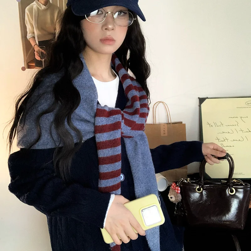 Herfst en winter nieuwe imitatie kasjmier gestreepte driehoekige gebreide sjaal handdoek om warm te blijven en gebreide halssjaal toe te voegen