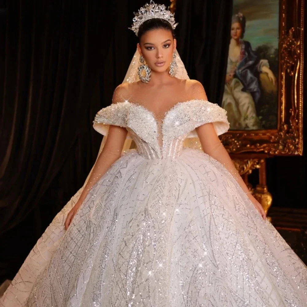 

Customize Luxurious Gown Wedding Dress Tulle O Neck Long Sleeve Bride Dress Sparkly Sequin Applique Beaded Wedding Gown