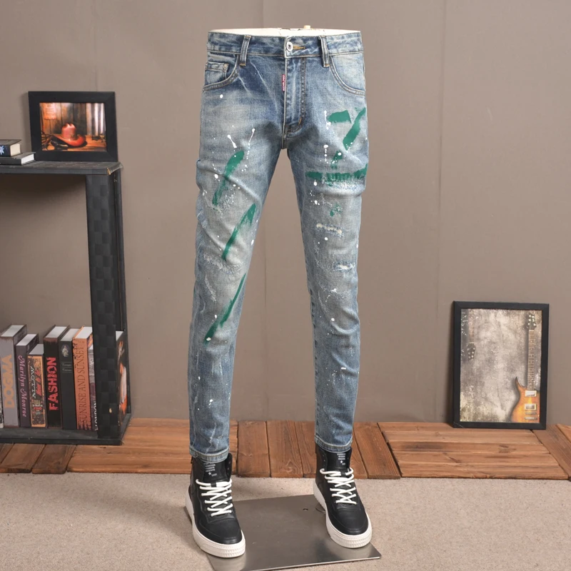 Autumn Men Light Blue Ripped Jeans Streetwear Casual Slim Fit Pencil Pants Fashion Graffiti Printed Patch Denim Trousers CP2020