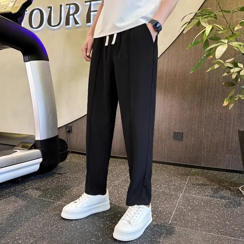 

Men Solid Color Drawstring Waist Tapered Pants Casual Vertical Seam Ankle Length Sports Trousers For Male