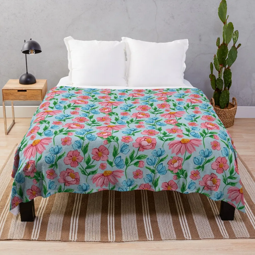 

Hand painted painterly feminine gouache pink flowers and blue flowers on a light blue background Throw Blanket Thin Blankets