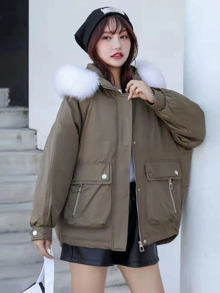 

Женский пуховик на белом утином пуху, с воротником из натурального Лисьего меха