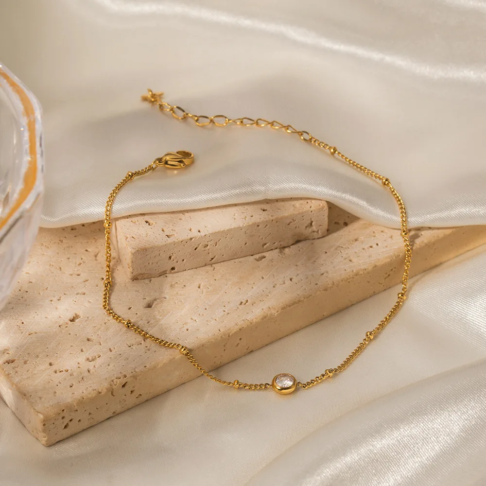 الفولاذ المقاوم للصدأ PVD 18K مطلية بالذهب تشويه مقاوم للماء ببساطة حجر الراين سلسلة القدم للمرأة مجوهرات بالجملة العصرية