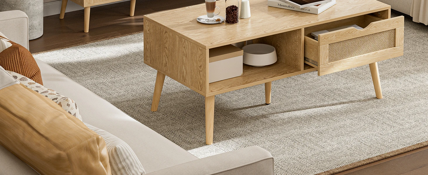 Angle view of oak coffee table with rattan storage drawer
