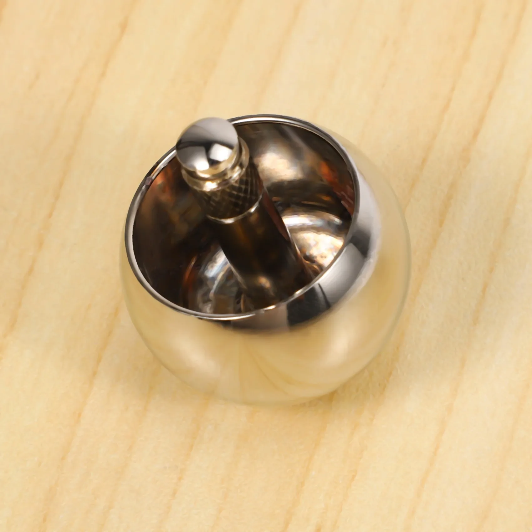 Tippe Top Metal Flip over Top Stainless Steel Spinning Top ของขวัญของเล่นที่น่าทึ่ง สีเงิน