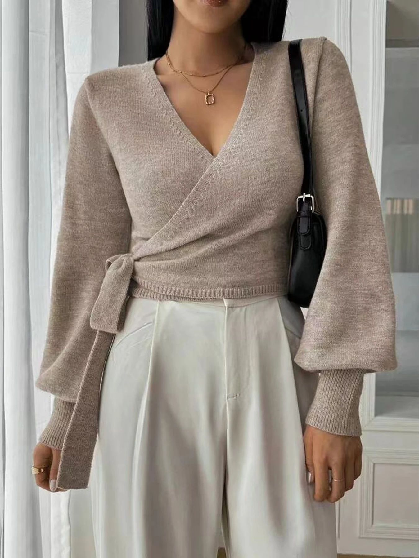 

Ladies' autumn and winter fashion solid color V-neck lace up cardigan knitted sweater