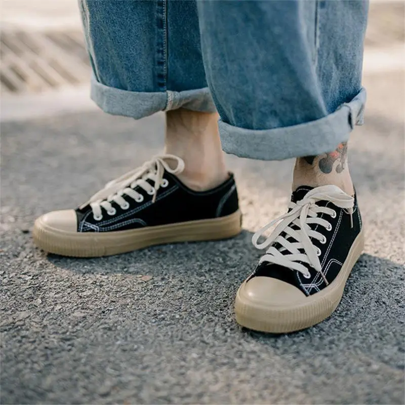 Scarpe da ginnastica piatte da uomo alte per il tempo libero in tela con lacci sportive primavera autunno scarpe vulcanizzate da uomo traspiranti